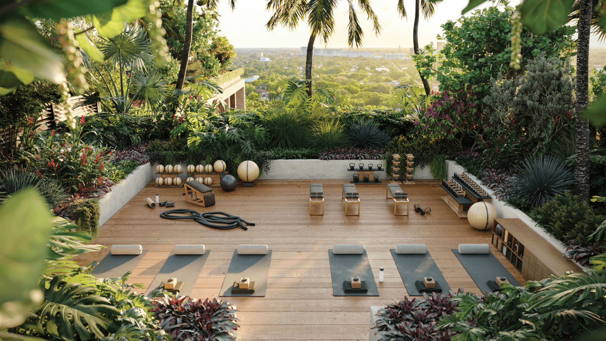 terraza de yoga al aire libre en The Well Coconut Grove residencias wellness en Miami